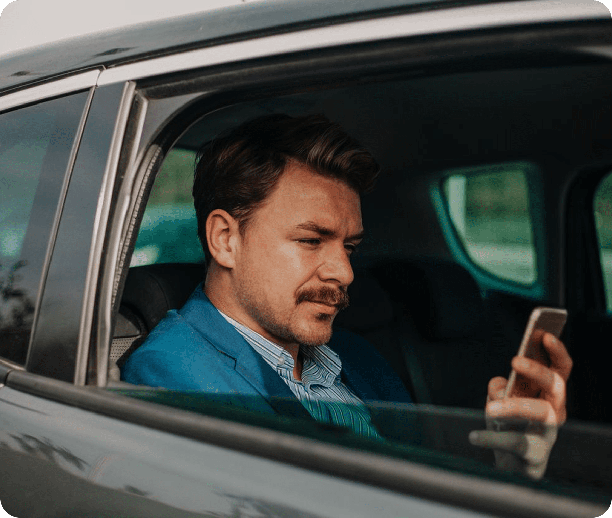 Person using smartphone while traveling